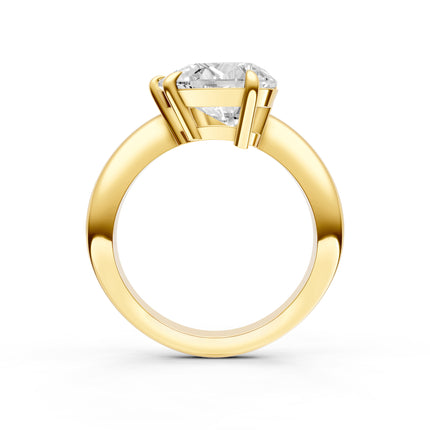 A profile view of a yellow gold, diamond solitaire engagement ring. 