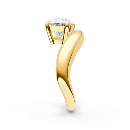 A side view of a yellow gold solitaire diamond engagement ring. 