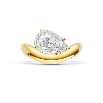A top view of a curved yellow gold, pear shape, diamond solitaire engagement ring