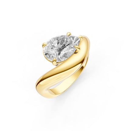 A yellow gold, pear cut, curved diamond engagement ring. 