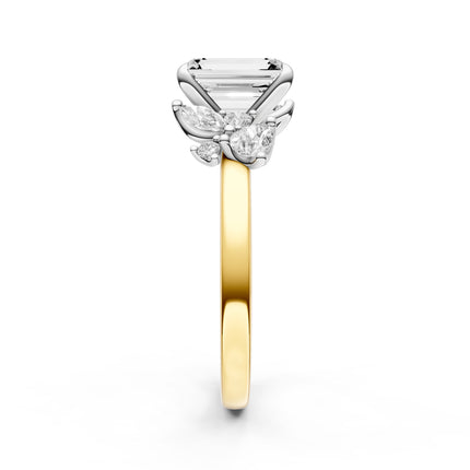 A side view of a floral inspired diamond accent engagement ring in yellow gold. 