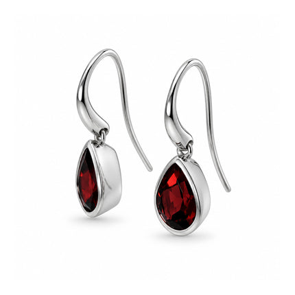 A side view of a garnet drop earring in sterling silver. 