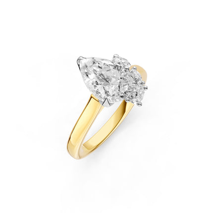A yellow gold, pear shape, floral diamond engagement ring