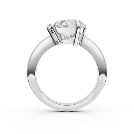 A profile view of a white gold, diamond solitaire engagement ring. 