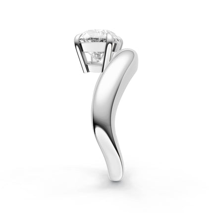 A side view of a white gold solitaire diamond engagement ring. 