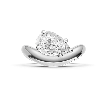A top view of a white gold pear shape solitaire curved engagement ring