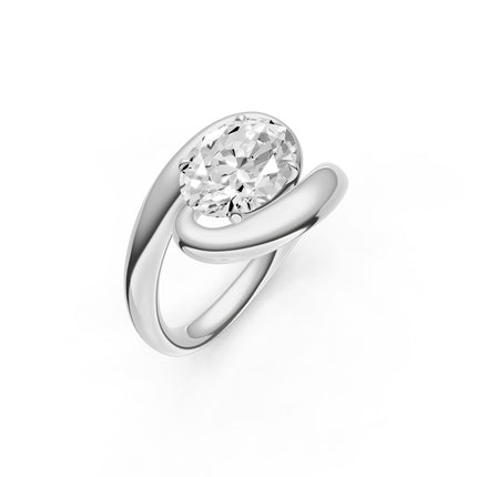 A white gold, oval, bypass diamond engagement ring. 