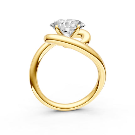 A profile view of a bypass diamond engagement ring 