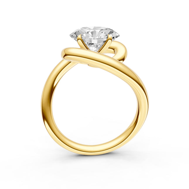 A profile view of a bypass diamond engagement ring 