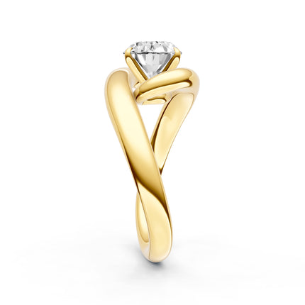 A side view of a yellow gold diamond engagement ring