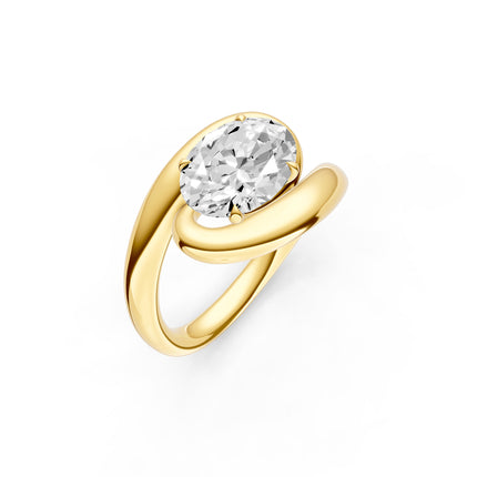 A yellow gold, oval cut, east-to-west, bypass engagement ring. 