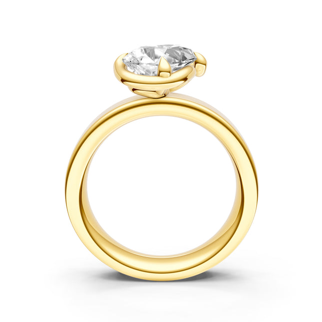 A yellow gold solitaire diamond engagement ring side profile